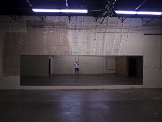 A self portrait in an empty dance studio.